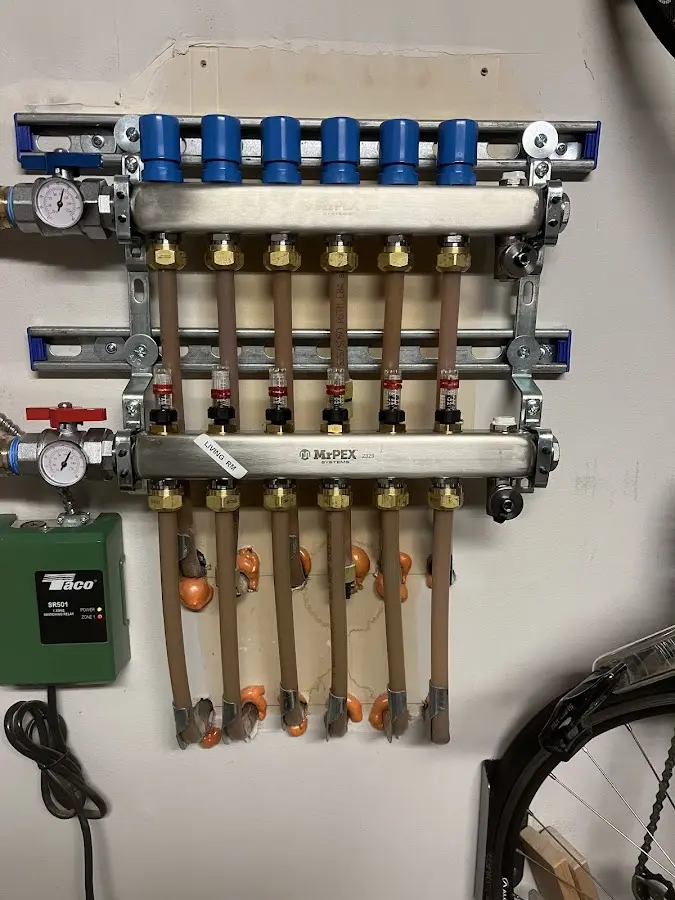 Plumber performing Water Heater Repair at a residential property in Fort Riley